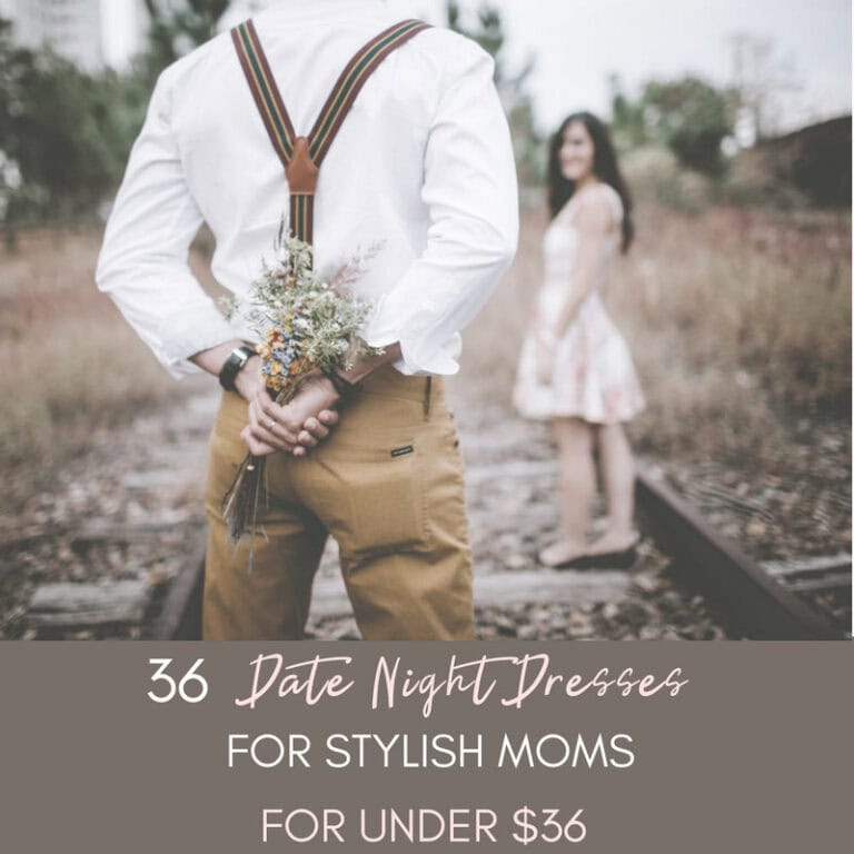 Couple on railway tracks, man holding a flower bouquet behind his back, woman in dress in the background, rustic outdoor setting, romantic date night outfit.