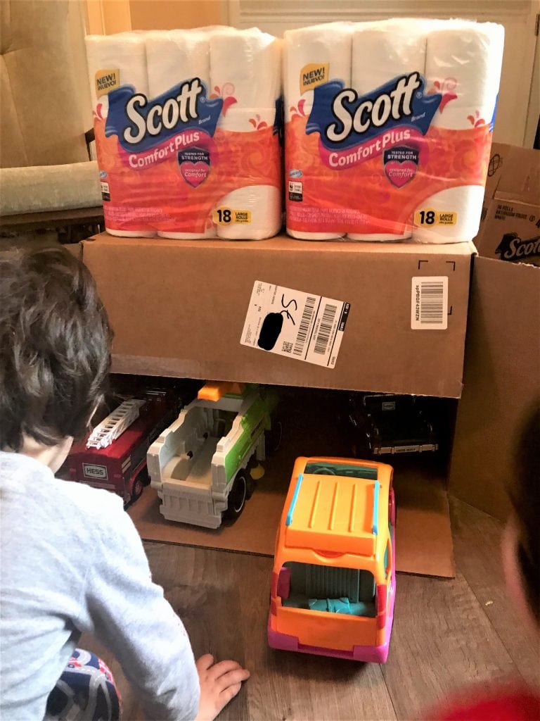 Softest bath tissue packs in a home storage area.