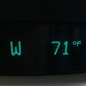Low temperature digital display showing 71°F in an indoor setting.