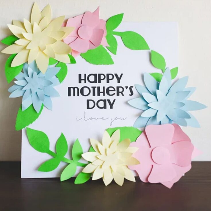Colorful handcrafted paper Mother's Day card with floral design and heartfelt message.