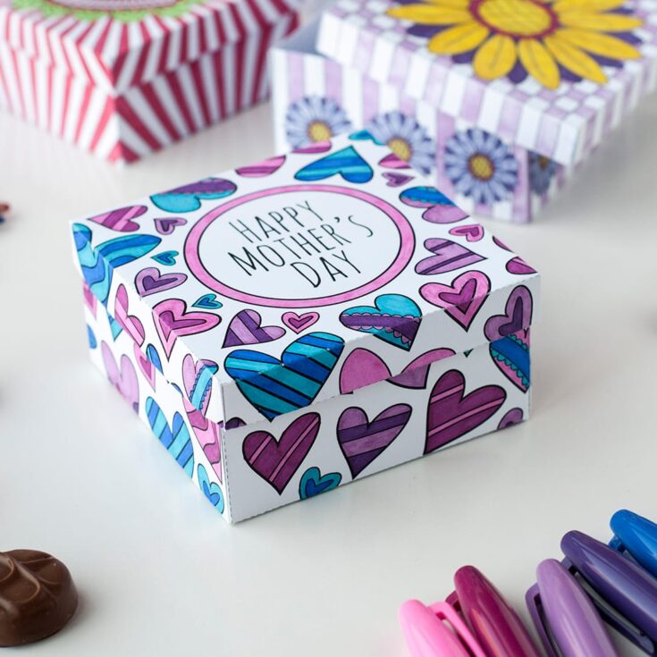 Colorful Mother's Day gift box with heart patterns and "Happy Mother's Day" message, ideal for celebrating and showing appreciation for moms.