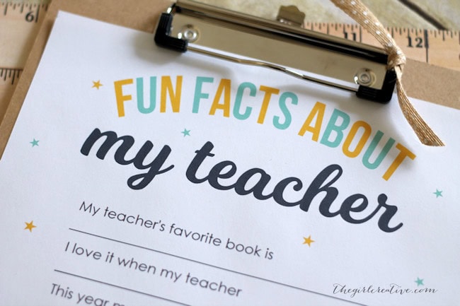 Bright educational worksheet titled "Fun Facts About My Teacher" on classroom clipboard, perfect for teacher appreciation and student engagement in learning.