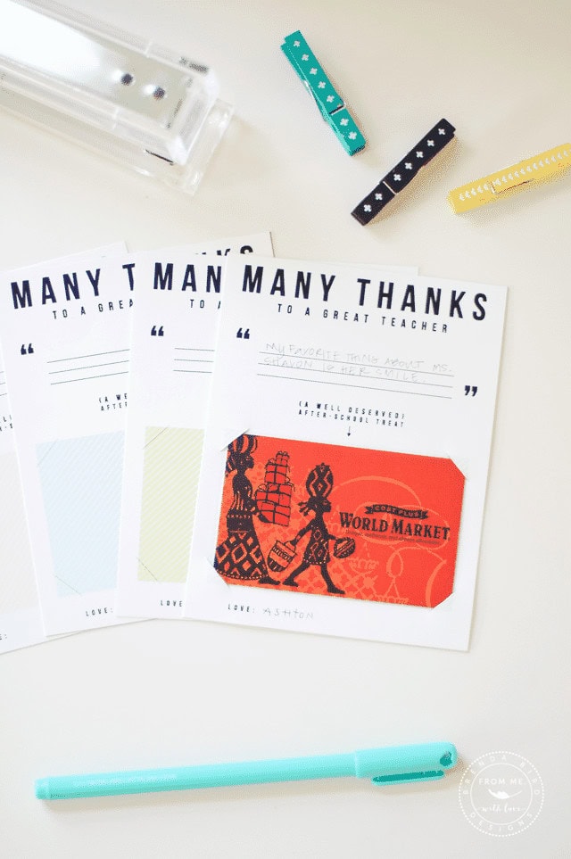 Colorful thank you notes with World Market gift card and decorative paper clips, perfect for expressing gratitude and adding a personal touch to appreciation gestures.