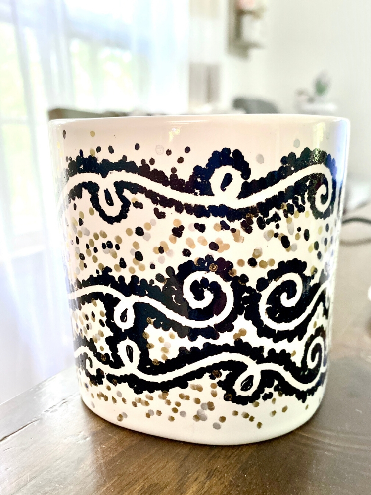 dotted swirls on diy sharpie mug from stickers