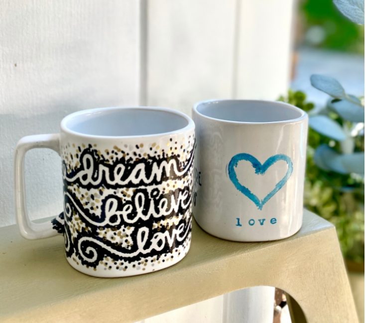Hand-painted inspirational coffee mugs with love and dream messages, perfect for gifting or everyday motivation, by A Hundred Affections.