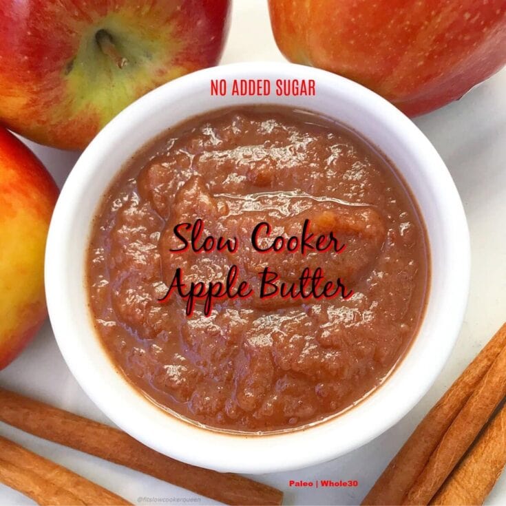 Copper apple butter in white bowl with apples and cinnamon sticks, no added sugar, healthy slow cooker apple butter recipe, paleo, Whole30, homemade apple butter, flavorful apple spread, natural fruit preserves.