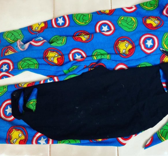 Colorful Marvel superheroes themed face mask and fabric featuring Iron Man, Captain America, and Hulk motifs, perfect for kids or superhero fans.