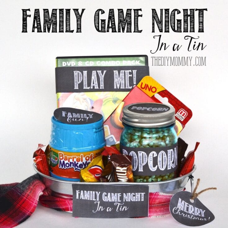 Festive family game night gift basket featuring popcorn, UNO card game, family-themed treats, and holiday tags for Christmas and family fun. Perfect for holiday celebrations and game nights.