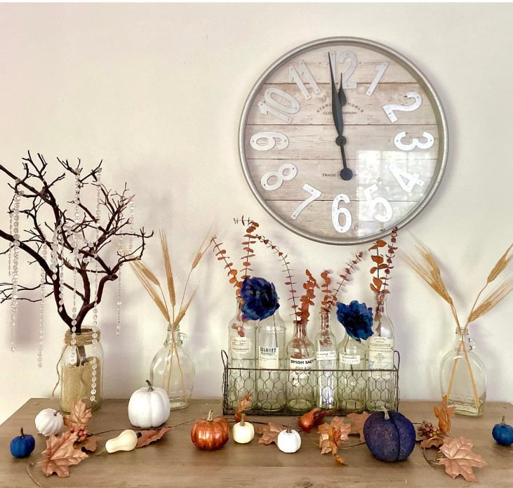 Fall home decor with dried flowers, pumpkins, and rustic accents, perfect for autumn seasonal styling, modern farmhouse interior design, cozy farmhouse aesthetic, autumn table setup, and fall decorating ideas.