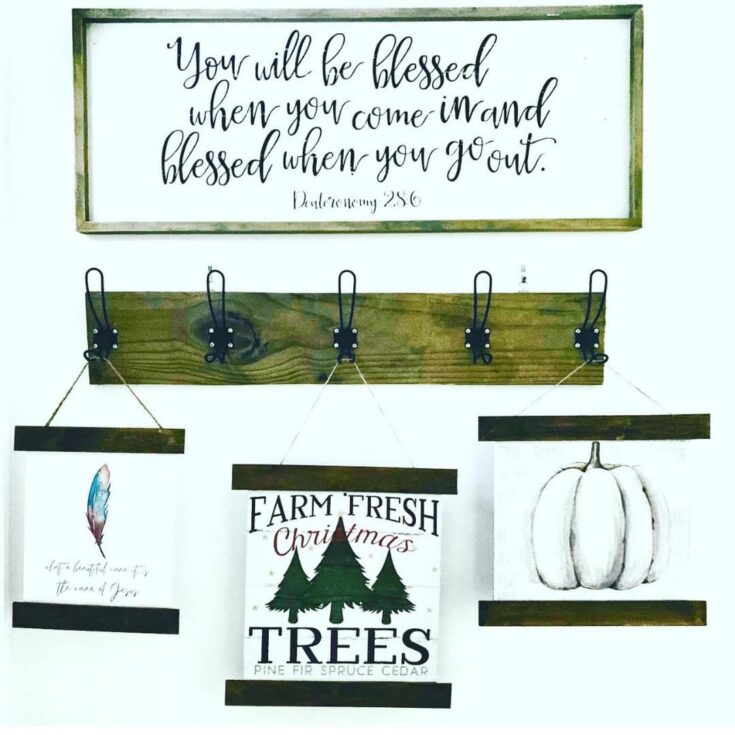 Rustic farmhouse wall decor with inspirational quote, holiday-themed signs, and autumn pumpkin art, perfect for cozy Christmas and fall home decoration.