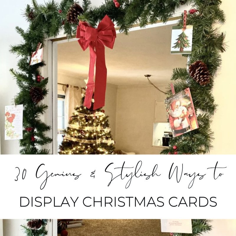 Festive Christmas wreath decor with pinecones, red ribbon bow, holiday cards, and a glowing Christmas tree inside a cozy home setting. Perfect for holiday decoration ideas.
