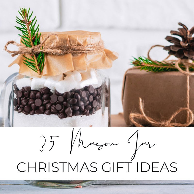 Delicious holiday-themed mason jar gift with chocolate, marshmallows, and festive decorations, perfect for Christmas gift ideas from A Hundred Affections.