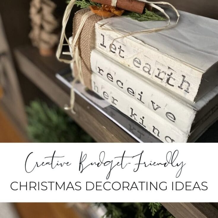 Set of vintage-style books stacked with holiday decor, featuring rustic and farmhouse-inspired Christmas decorating ideas. Perfect for creative, budget-friendly holiday home decoration.