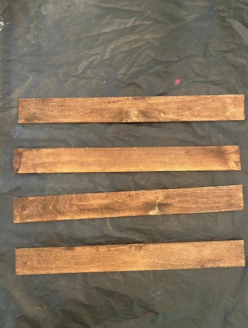 Charred wooden planks for rustic decor or furniture, natural wood finish, eco-friendly crafts, DIY woodworking projects, reclaimed wood material.
