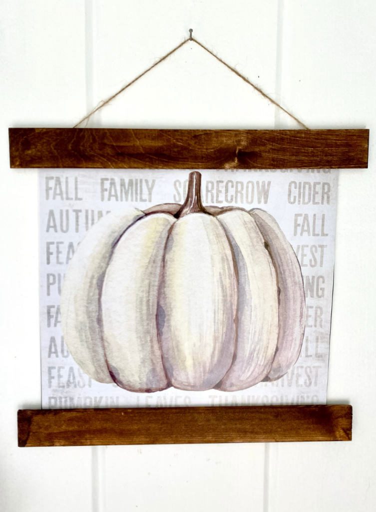 Warm white pumpkin wall art with fall-themed decor, perfect for autumn home inspiration, farmhouse style, and seasonal decorations.