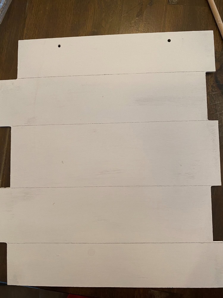 Unfinished white wooden pallet for rustic home decor or DIY furniture projects, weathered surface with visible wood grain, perfect for painting or repurposing in farmhouse style design.