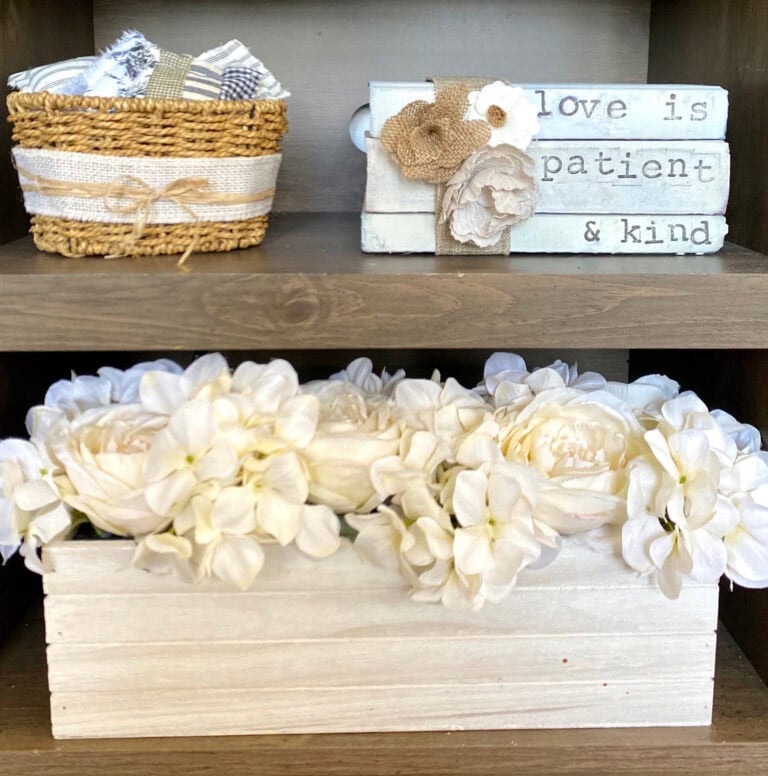Delicate wall shelves with rustic wooden accents displaying romantic decor, floral arrangements, and inspirational quotes, perfect for cozy home decor or wedding decor ideas.