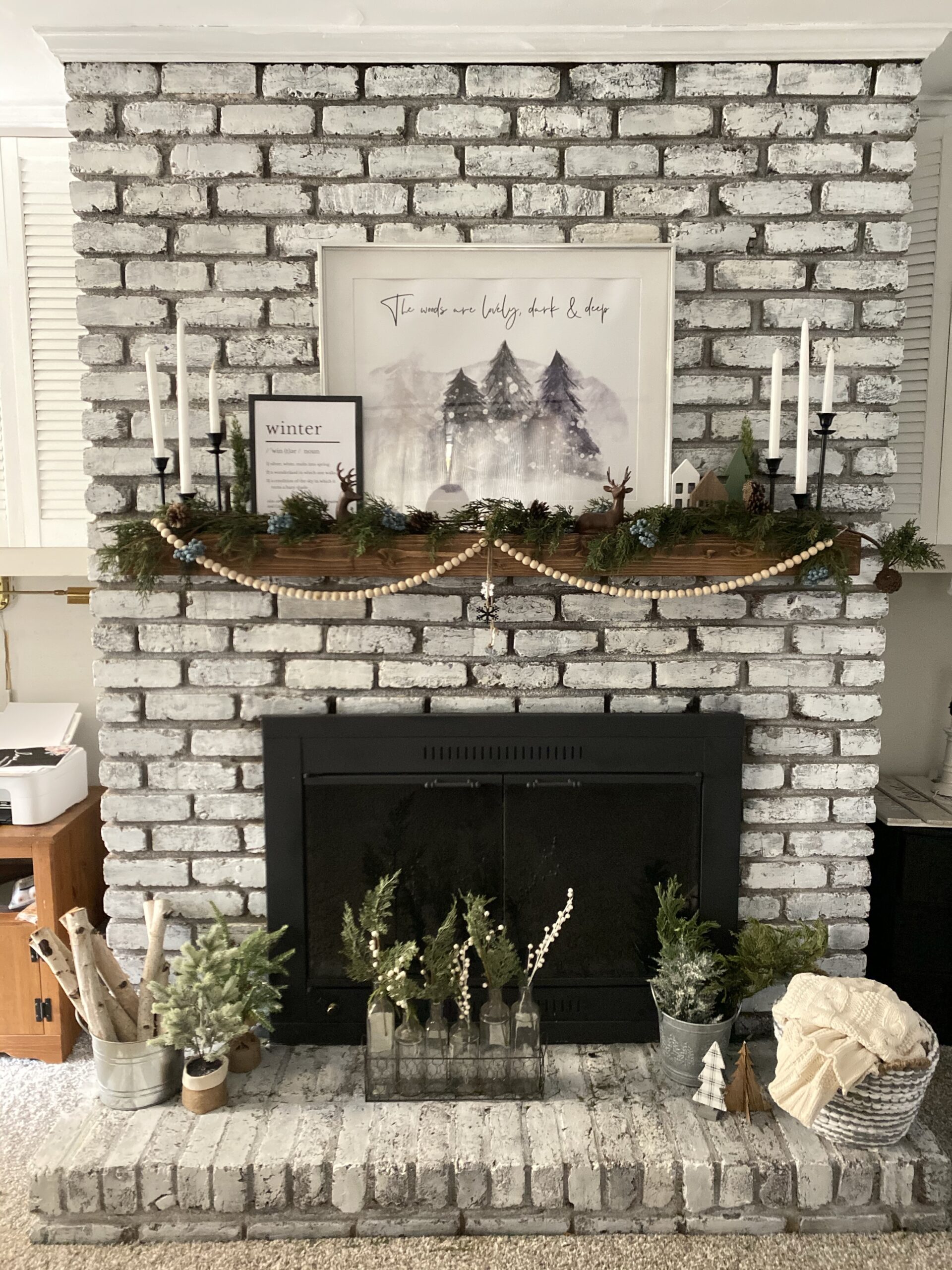 winter rustic mantel decor styled in farmhouse style
