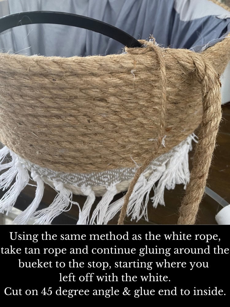 Twine-wrapped bucket with white tassel trim, used for decorative or craft purposes, with instructions on how to glue the handle.