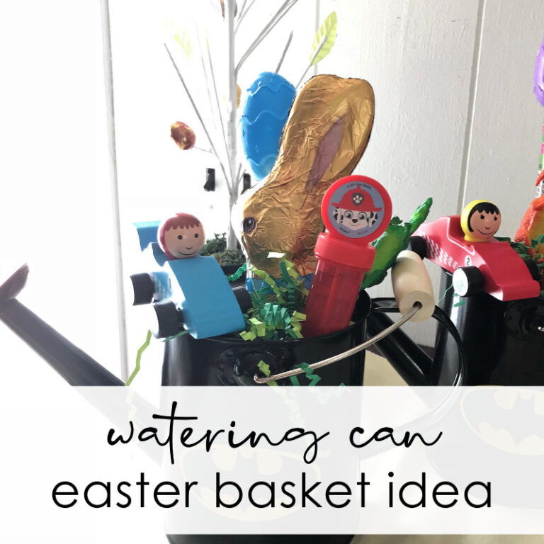Cute Easter basket with toy figurines, chocolate bunny, and colorful decorations, perfect for Easter gifting and spring celebrations.