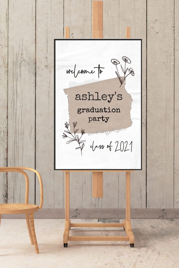 Welcome to ashley's graduation party sign with floral accents and a rustic design, perfect for celebrating the graduation class of 2021.