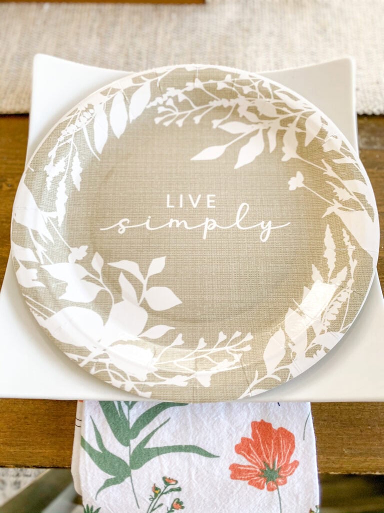 fun dishtowel under paper plate for tablescape