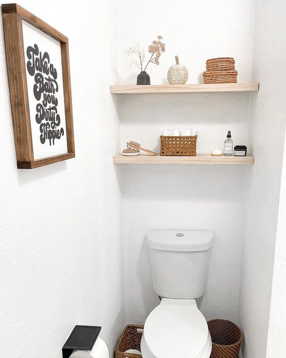 minimalist bathroom shelves with woven baskets and decor