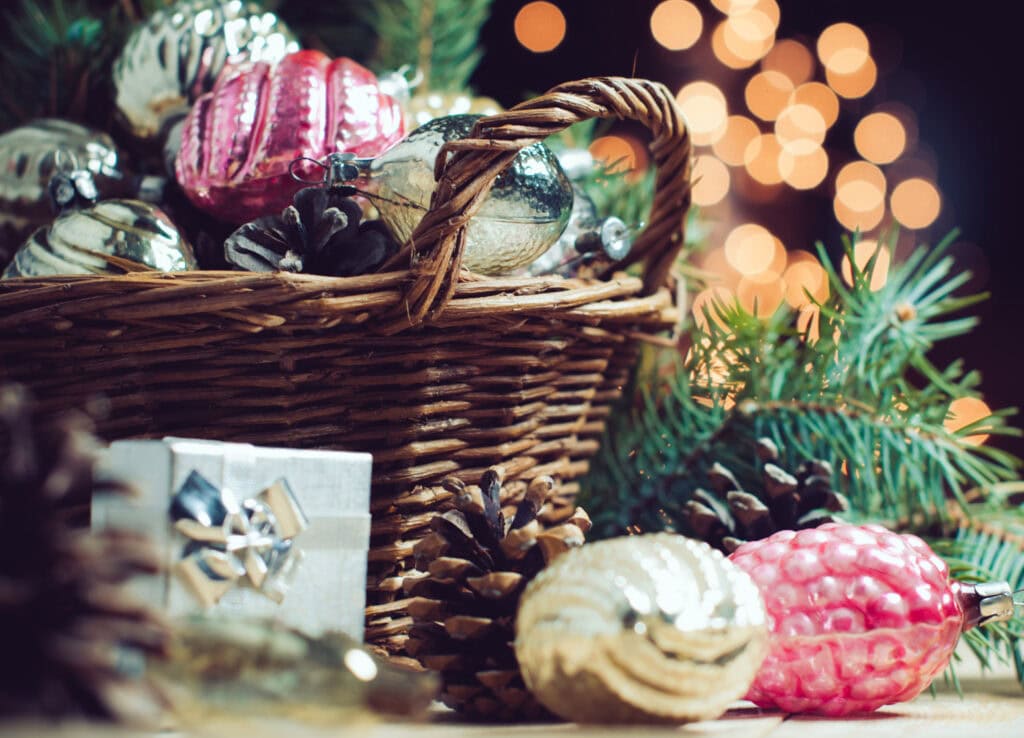 vintage basket with vintage Christmas ornaments