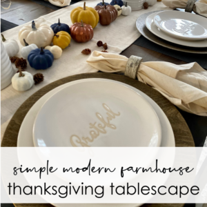 simple modern farmhouse thanksgiving tablescape grateful plate, pumpkins on table runner