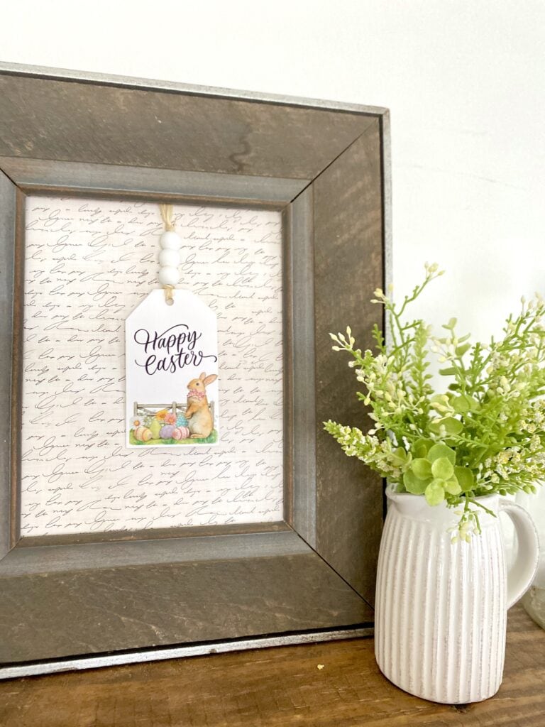 rustic frame with scrapbook and easter tag and floral arrangement 