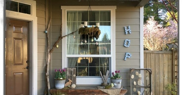 Cozy front porch decor with a welcoming "HOP" sign, fresh tulips, and rustic accents, perfect for adding warmth and charm to your home entrance. Ideal for spring decor ideas and enhancing curb appeal.