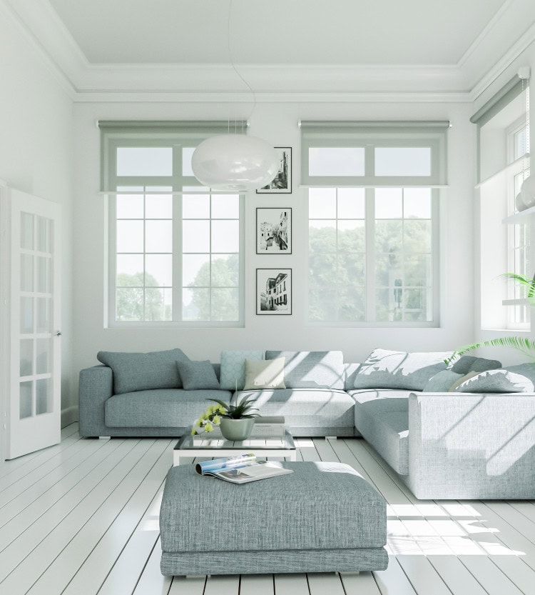 white living room with large windows and neutral furniture for light bright decor