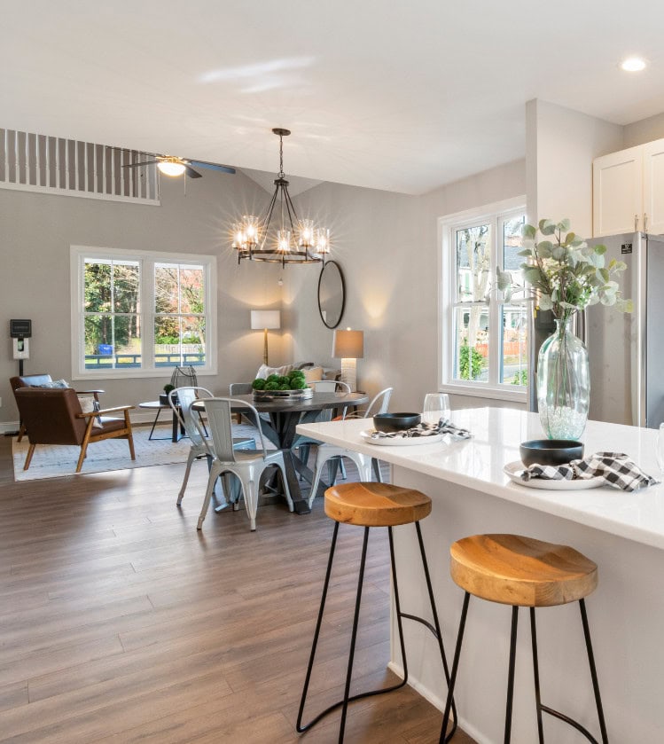 open kitchen, dining table ,living room with rustic chandelier