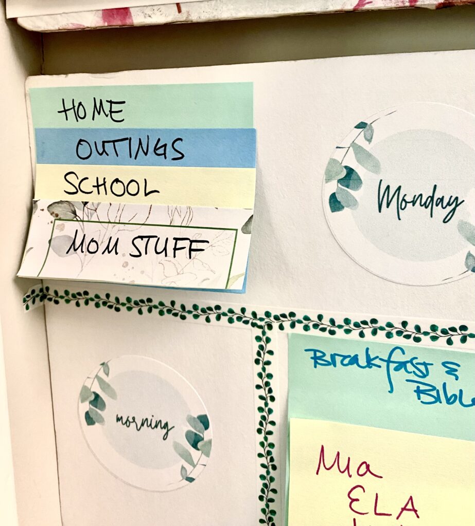 color code post it notes on foam board weekly planner