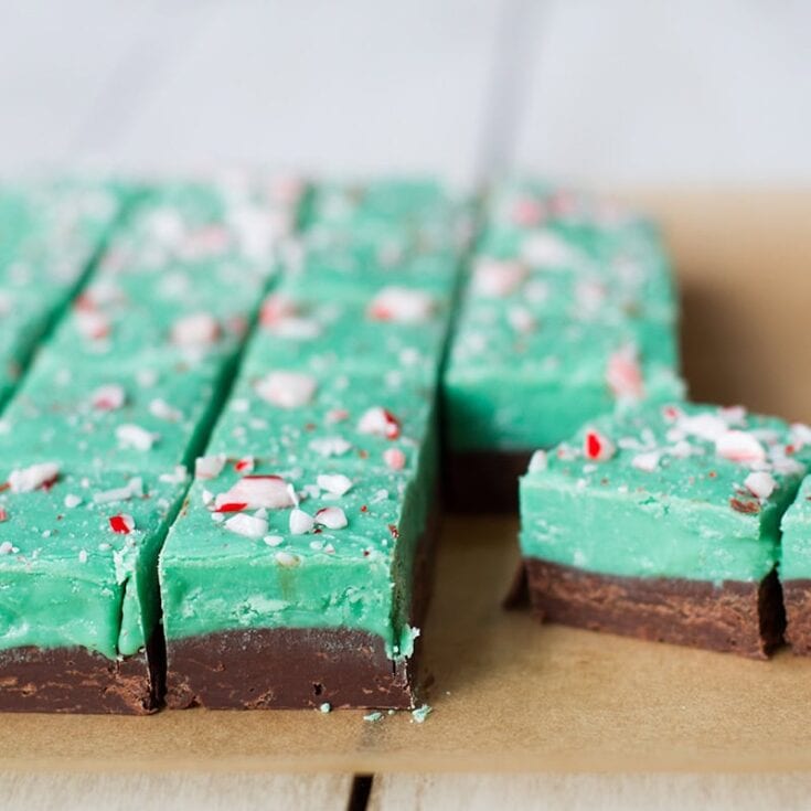 Green peppermint bark with chocolate base, festive holiday treat, decorated with crushed peppermint candies, perfect for Christmas celebrations and gift-giving, homemade seasonal dessert from A Hundred Affections.