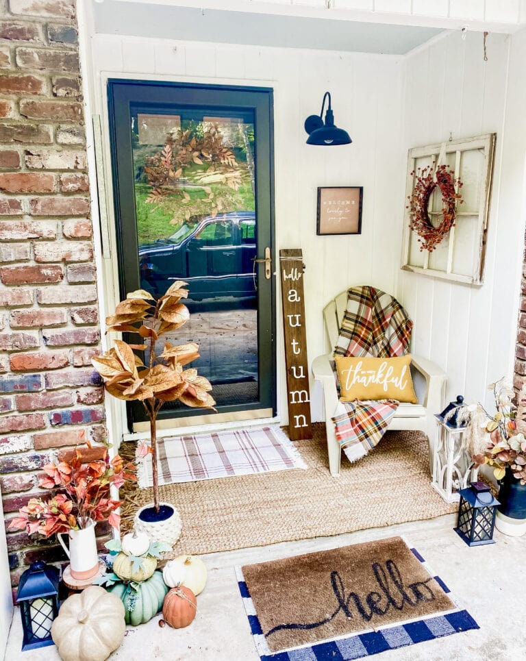 Welcome fall outdoor cozy porch decor with pumpkins, autumn foliage, and rustic accents for fall home decoration and seasonal welcoming space.
