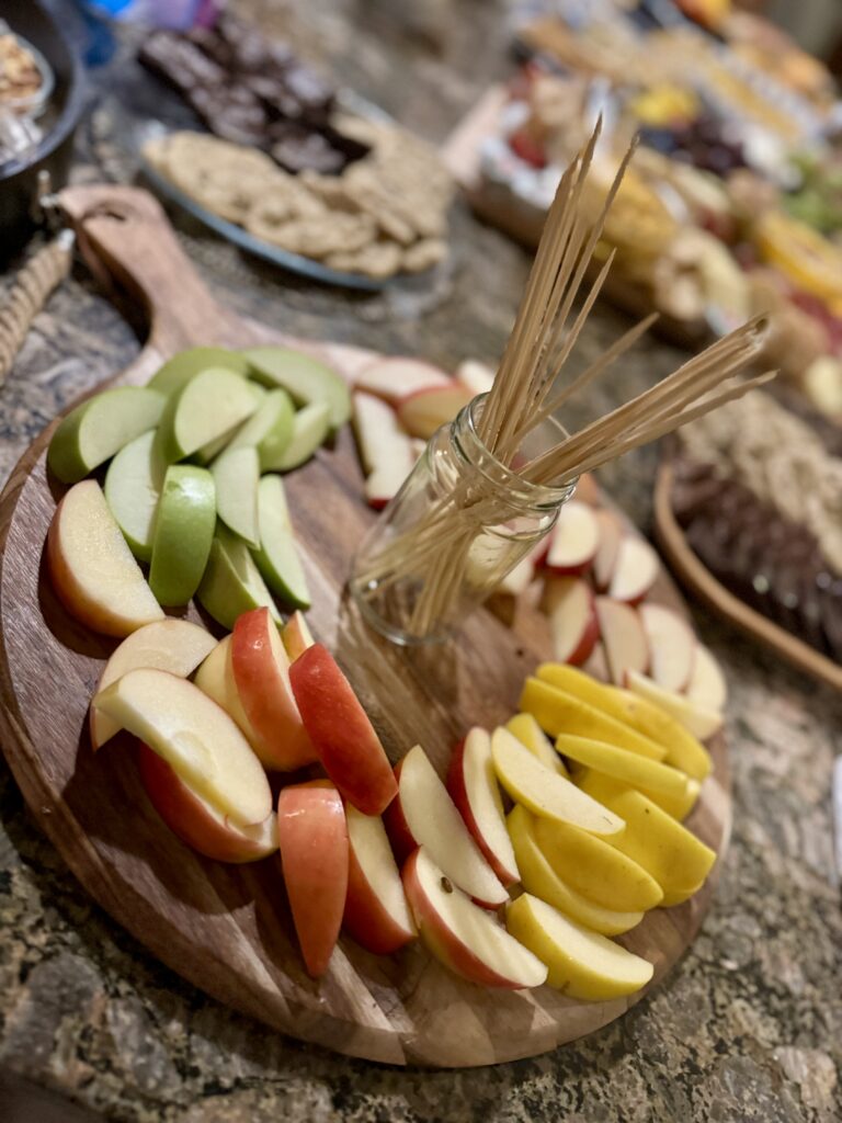 color variety of apples sliced on board