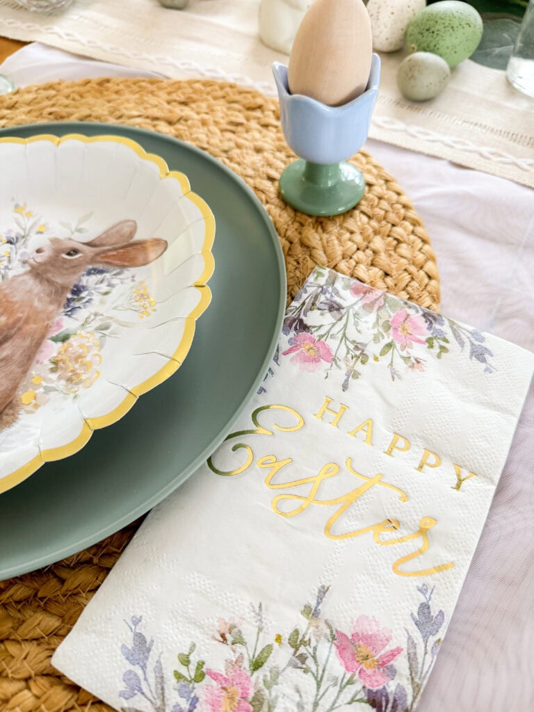easter napkin and bunny plate at place setting with tulip egg holder