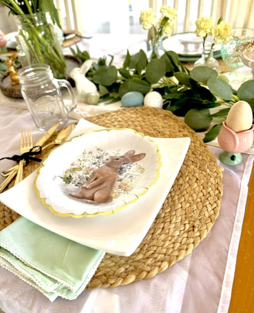 easter place setting with bunny plate and white square ceramic plate