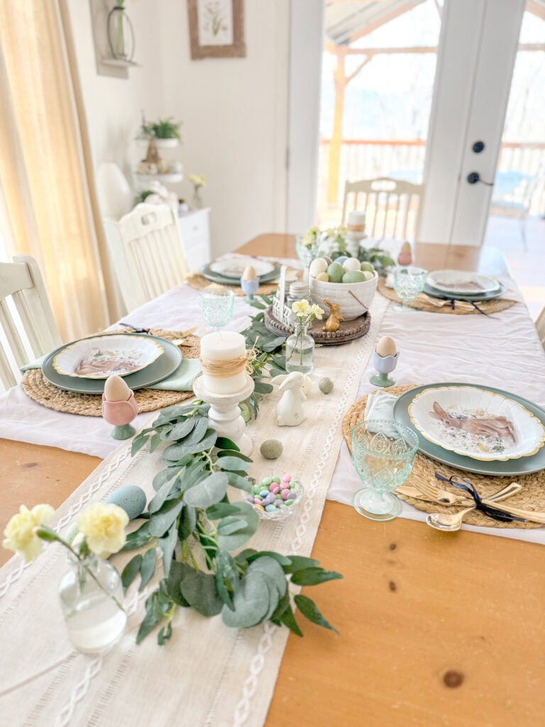 light airy spring tablescape with white sheer cloth and neutral runner, easter decor