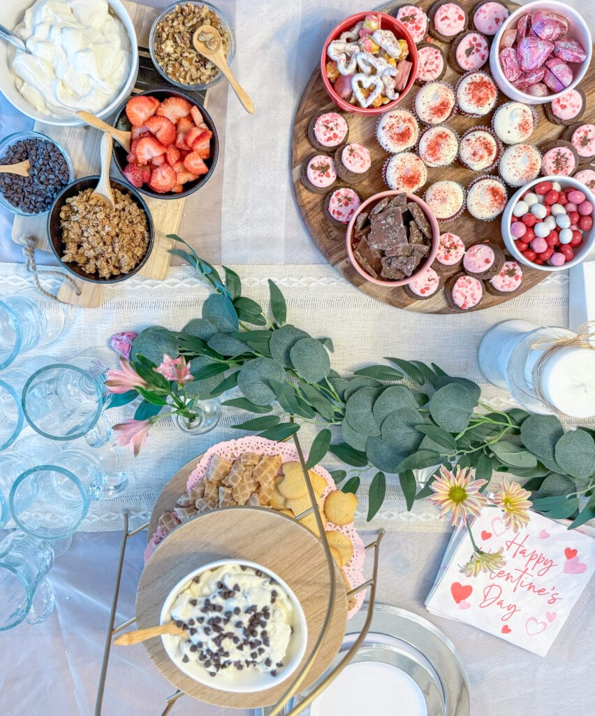 Valentines table with snacks and food for Galentine's Day