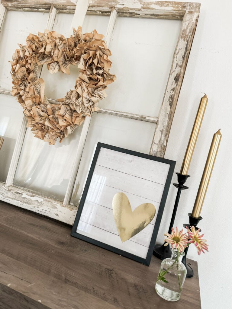 valentine decorations on console table with window and wreath