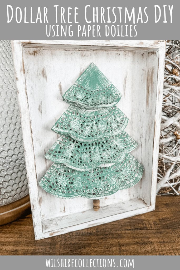 Handmade paper doily Christmas tree DIY craft for holiday decor and gift embellishments. Perfect for rustic, shabby chic, and vintage-inspired Christmas decorations. Easy to create using paper doilies and wood frame.