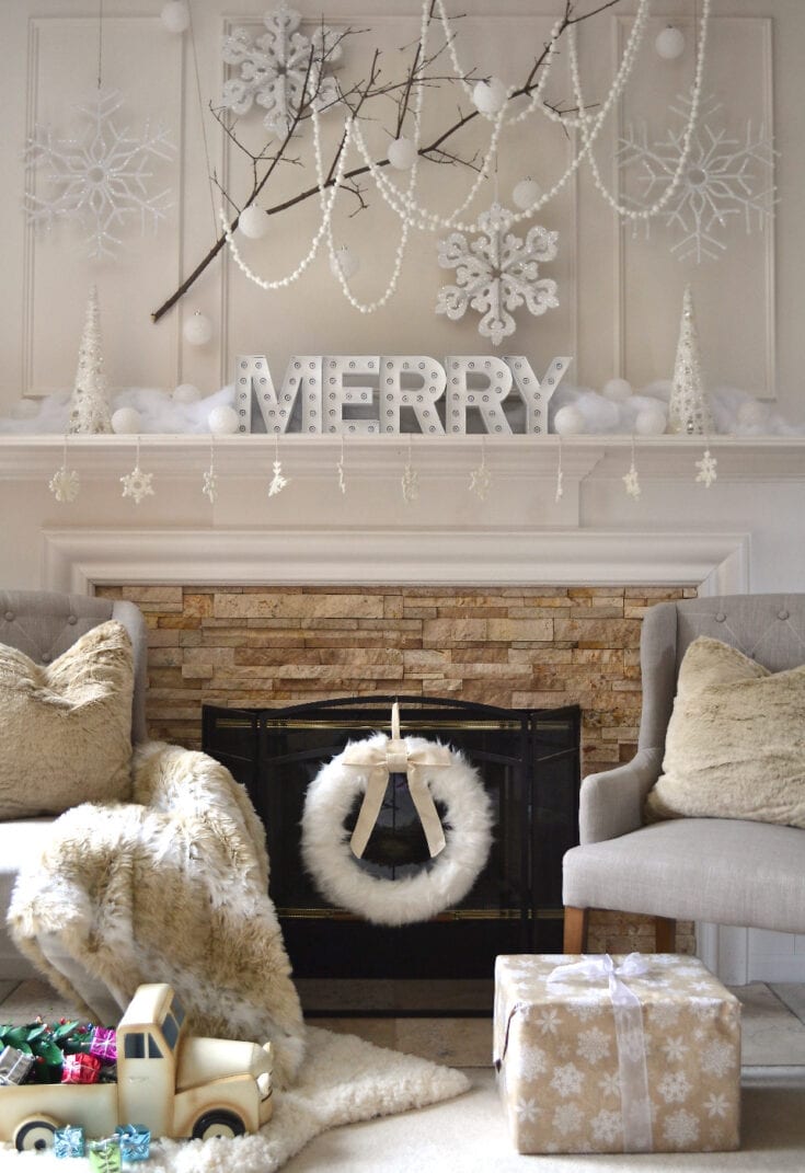 merry white christmas mantel with snowflakes and beads