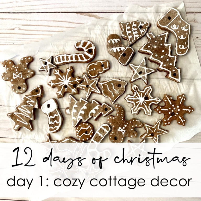 Decorative gingerbread cookies with white icing on a rustic wooden background, perfect for cozy Christmas cottage decor.