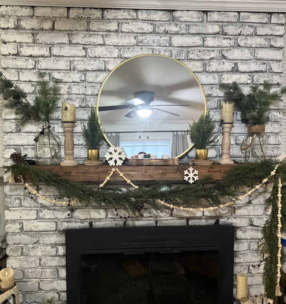 mix for rustic and modern winter decor with winter mantel idea