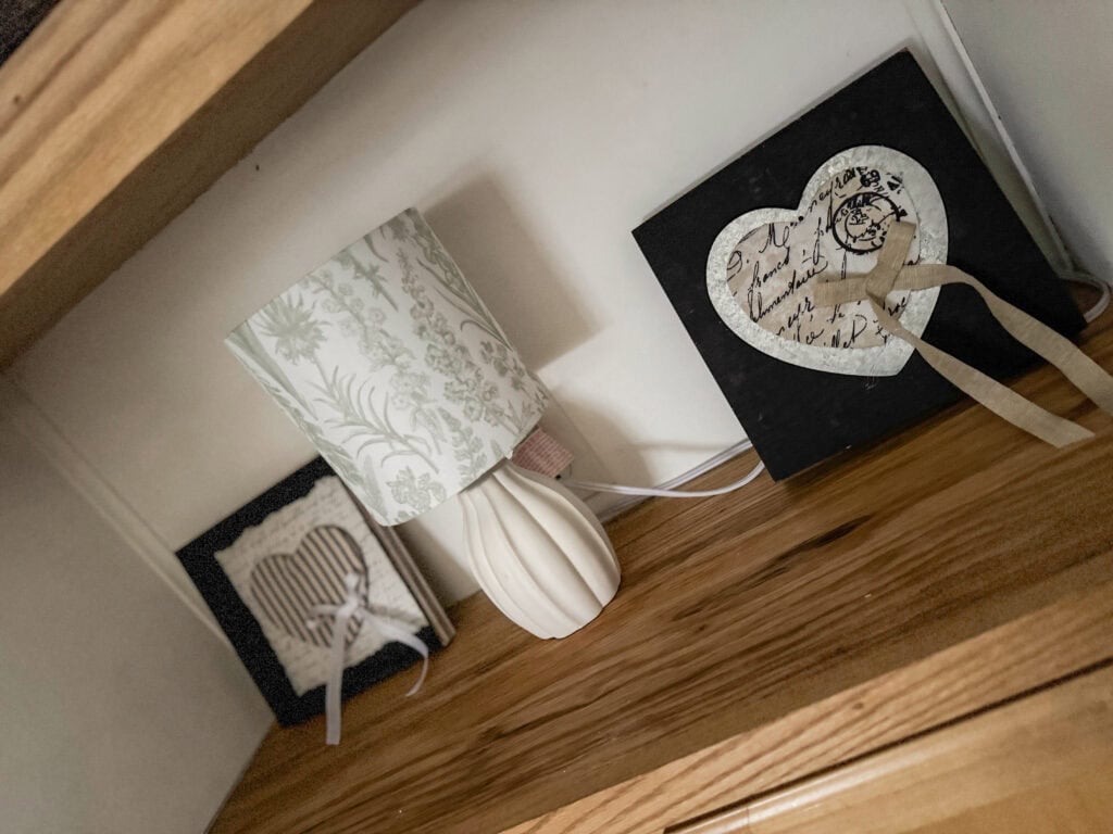 layered heart signs on built ins for diy valentine decor