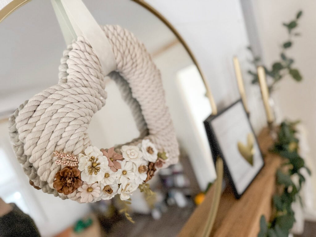 diy rope heart wreath on mantel mirror for subtle neutral valentine decor