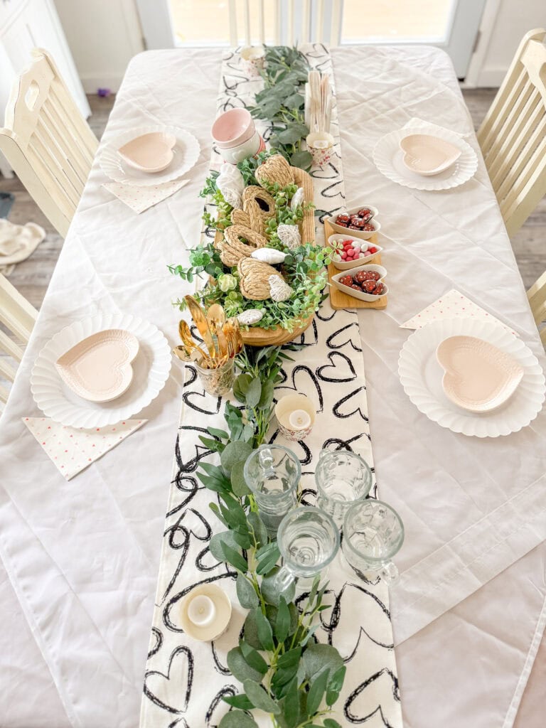 heart table runner and plates for valentine tablescape