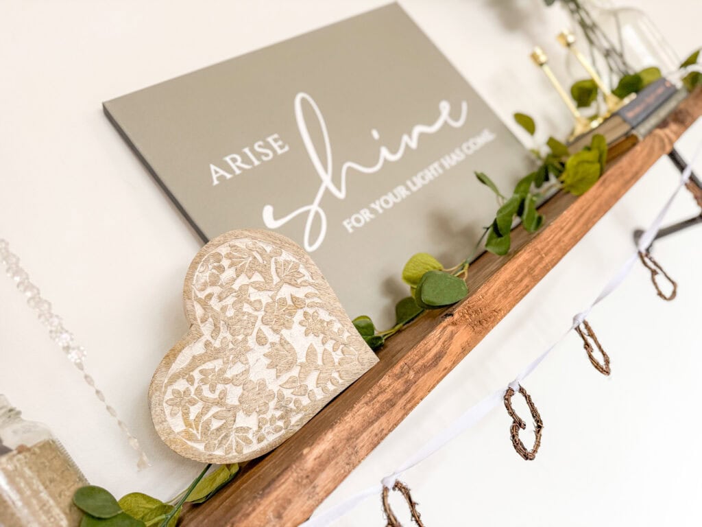 wood heart decorations on shelf